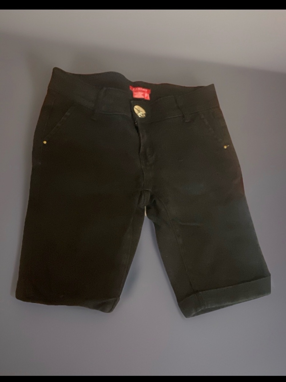 Astr Castro Black Garment Label with Red Tag